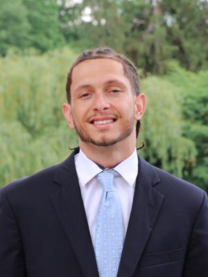 Headshot of Jahred Rosa-Sullivan