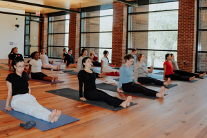 A yoga class in the Contemplative Commons