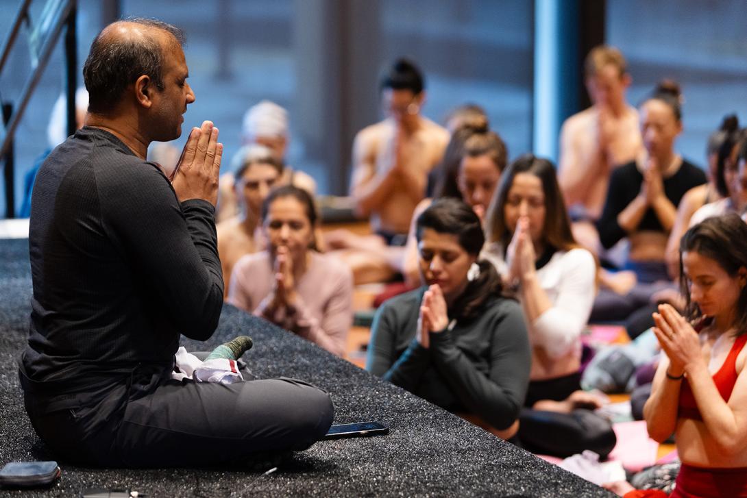 Sharath sitting with students nov 2024